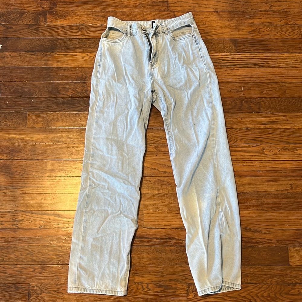Brand Okuohao, size small, light washed, holes at the hips (intentional)